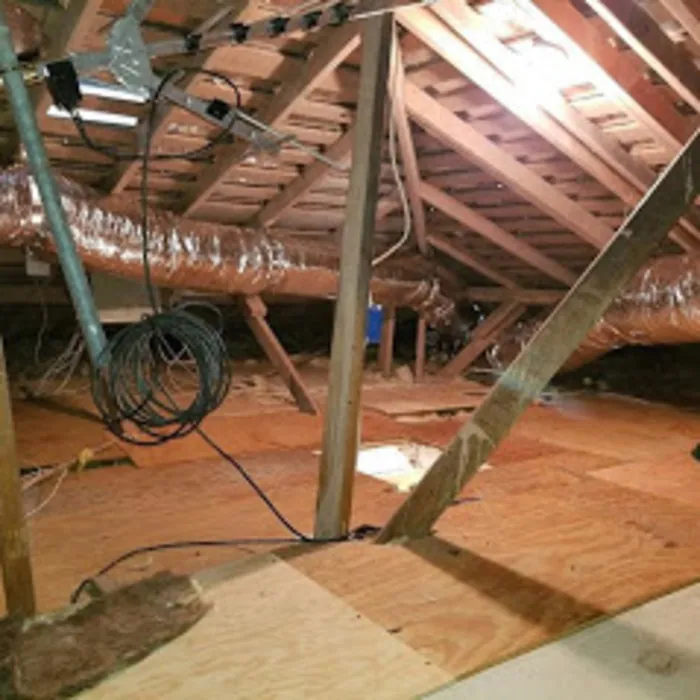 Attic with ducts and radiant barrier sheathing