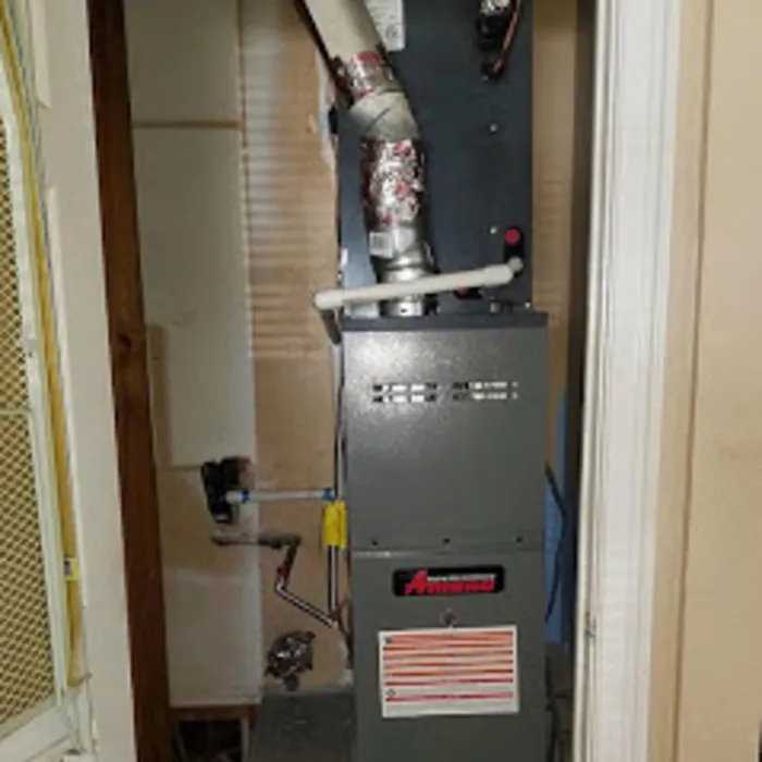 Upflow furnace installed in a hallway closet