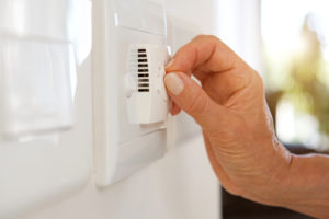 Person precooling their home