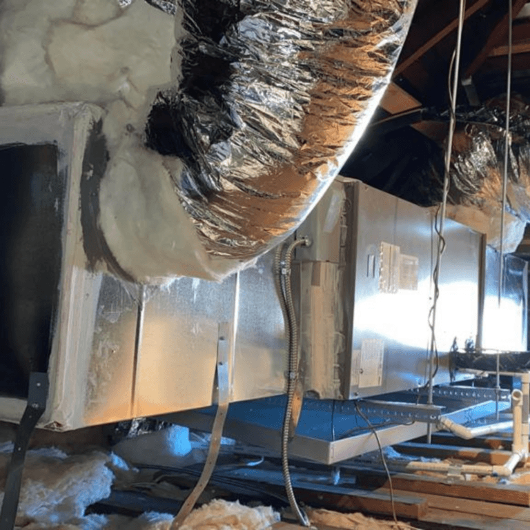 Insulated flex duct connections at a supply plenum