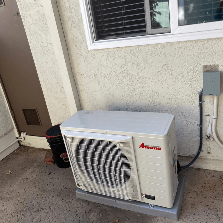 Amana ductless outdoor unit installed on a pad