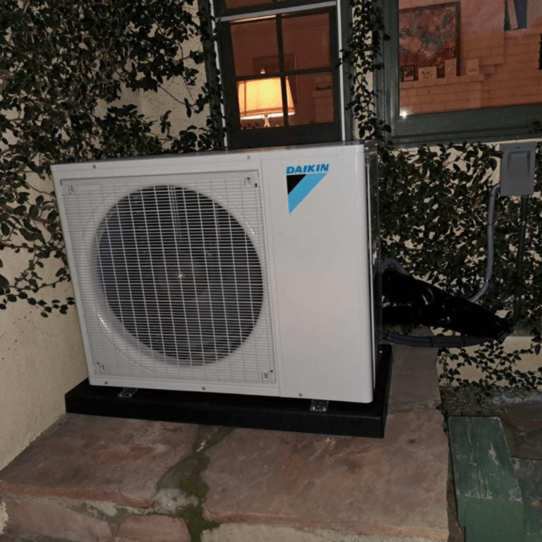 Daikin ductless outdoor unit installed on a patio